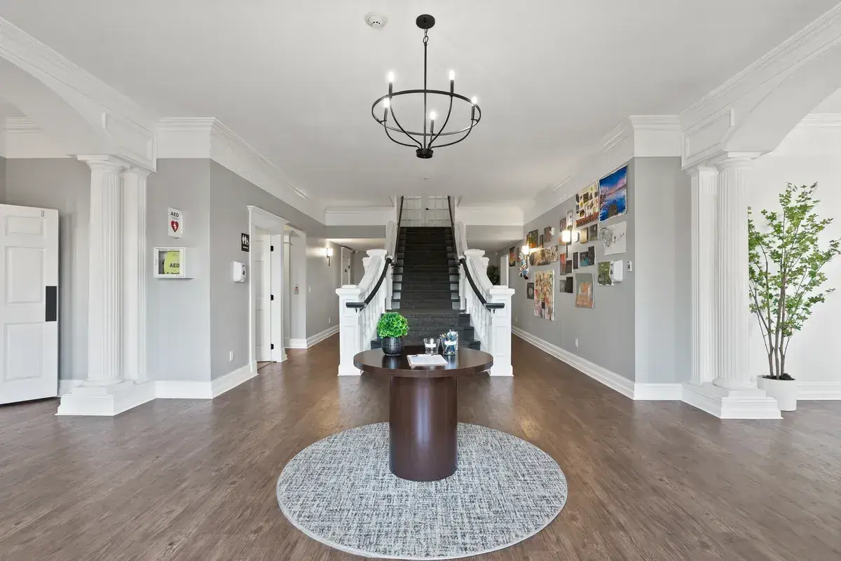Discover Recovery lobby with staircase, seating area, and gallery wall at the Camas, Washington treatment center