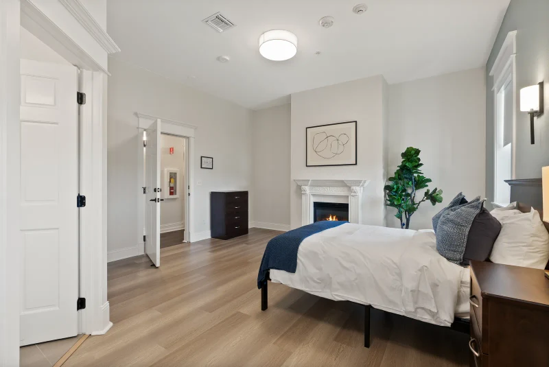 Private bedroom with fireplace during medically supervised detox at Discover Recovery in Camas, Washington