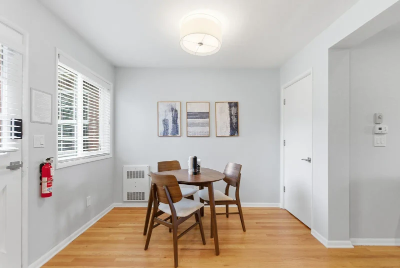 Dining nook with table and chairs in a Portland sober living home