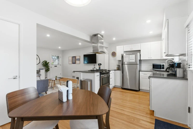Open kitchen, dining, and living area in a Portland sober living home