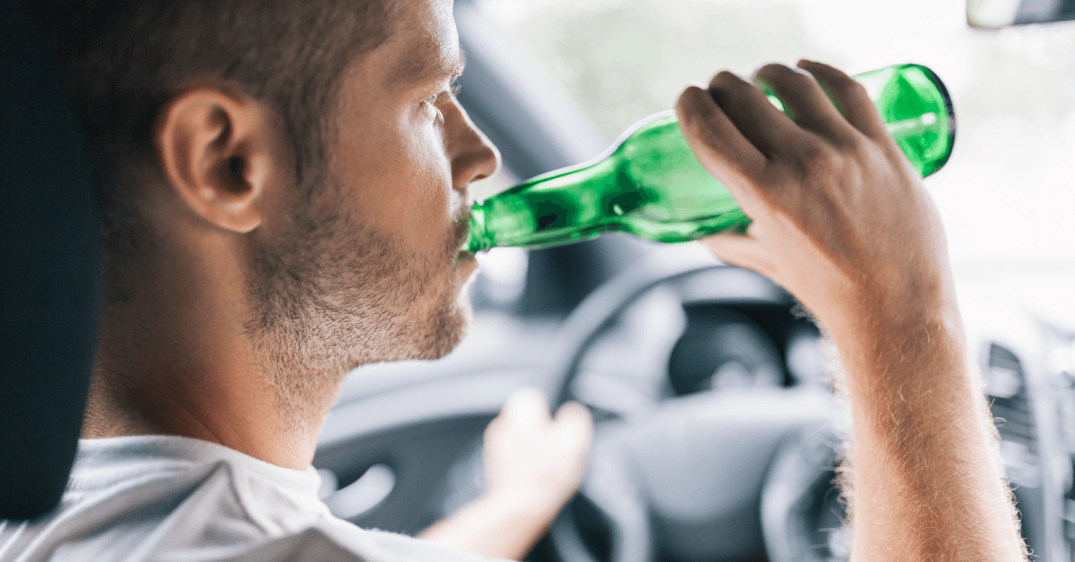 Man drinking and driving