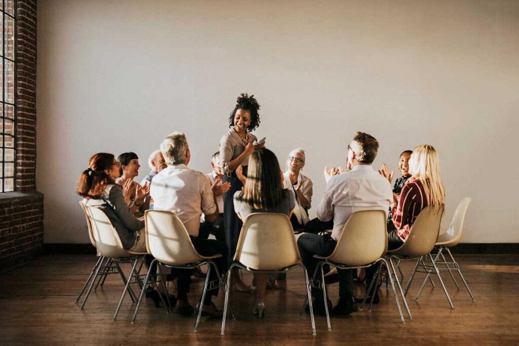 a therapist leads a group during inpatient alcohol rehab